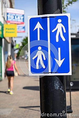 Walk on the left sign on Bromley High Street during the coronavirus pandemic Editorial Stock Photo