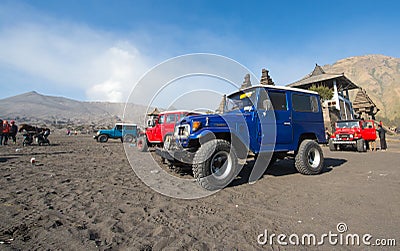BROMO, INDONESIA - Sep 13: Unidentified workers wait jeep rental for tourists at Mount Bromo on Sep 13, 2015 in Java, Indonesia. Editorial Stock Photo