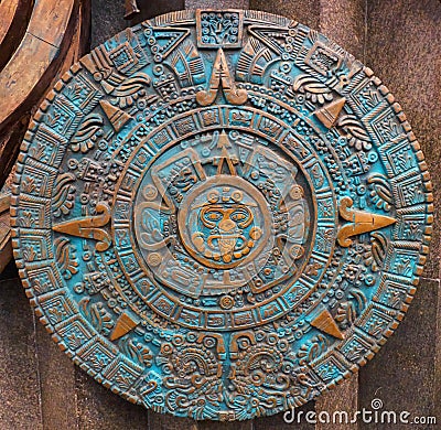 Bronze ancient antique classical Aztec calendar round ornament pattern decoration design background. Aztec abstract texture fracta Stock Photo