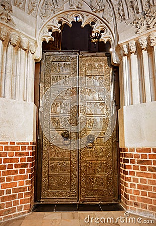 Bronze ancient doors in the temple which are over 1000 years old: Gniezno / Poland Editorial Stock Photo