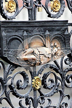 Bronze figure of the saint on the fence of the Cathedral of St. Vitus in Prague, Czech Republic. Stock Photo