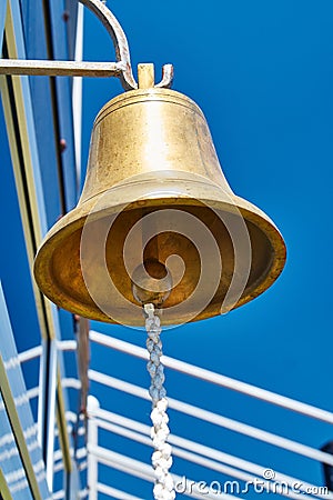 Bronze large bell on a tall ship Stock Photo
