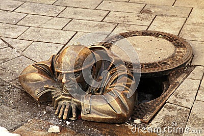 Bronze sculpture called man at work, Bratislava, Slovakia Editorial Stock Photo