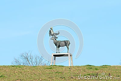 Bronze sculpture `Man in deer antlers` by Stephan Balkenhol. Sculpture on art path in Ratingen, Germany Stock Photo