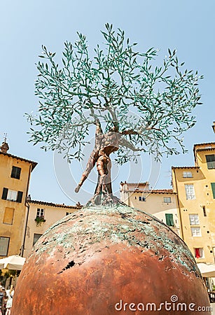 Bronze sculpture of the Tree of Life in the Amphitheater square in old town Lucca, Tuscany, Italy Editorial Stock Photo