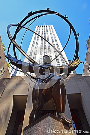 Bronze statue of Atlas in Rockefeller Center in Midtown Manhattan in New York City within courtyard of International Building Editorial Stock Photo