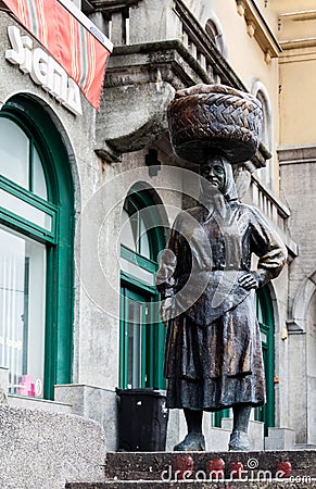 Bronze statue of a peasant market woman Editorial Stock Photo