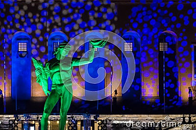 Bronze Statue of Poseidon in Sweden with colorful light show 2 Stock Photo