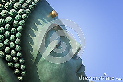 The bronze statue of reclining Buddha state at Nanzoin Temple in Sasaguri, Fukuoka, Japan.This is the bigest lying statue in the Stock Photo