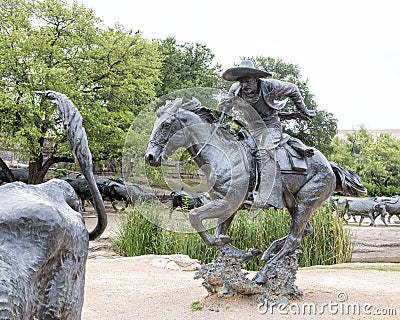 Bronze Steers and Cowboy Sculpture Pioneer Plaza, Dallas Stock Photo