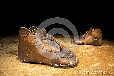 Bronzed baby shoes Stock Photo