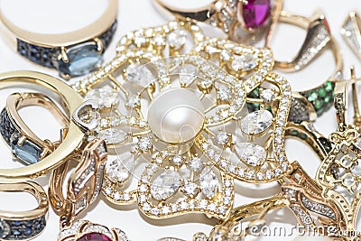 Brooch with pearls and gold jewelry Stock Photo