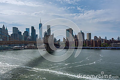 Brooklyn Bridge over East River view lower Manhattan waterfront New York City Stock Photo