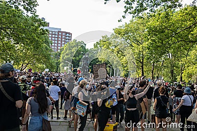 Peaceful protest at Grand army Plaza. Protesters holding signs Editorial Stock Photo