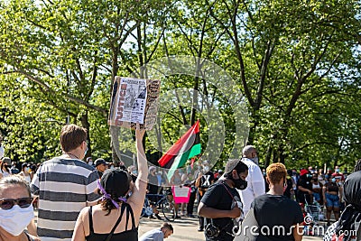 Peaceful protest at Grand army Plaza. Protesters holding signs Editorial Stock Photo