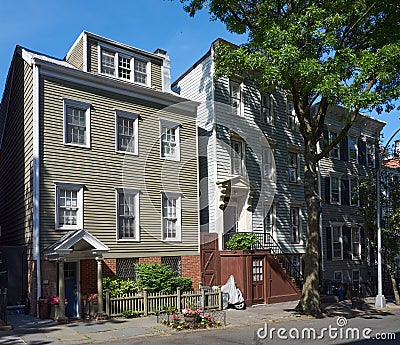 Three early 19th century wood frame houses on Middagh Street in Brooklyn Heights, NYC with clapboard facades Editorial Stock Photo