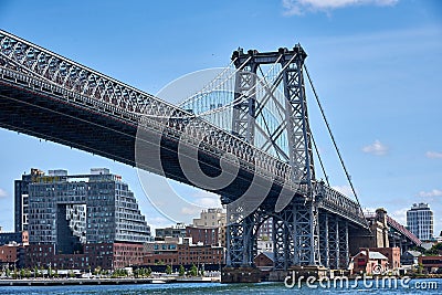 The Williamsburg Bridge spans the East River from the Lower East Side of Manhattan to Brooklyn, NY Editorial Stock Photo