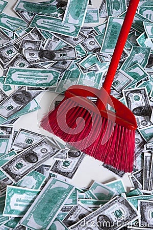 Broom in the money Stock Photo