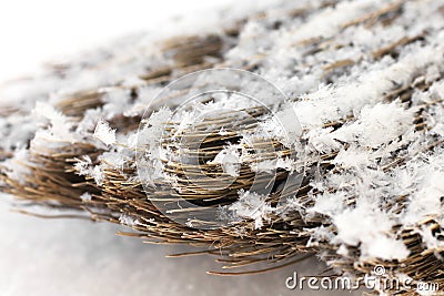 Broom in the snow Stock Photo