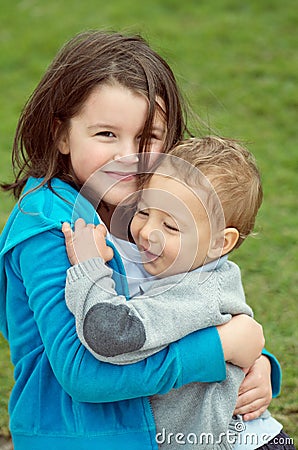 Brother and sister tenderness Stock Photo