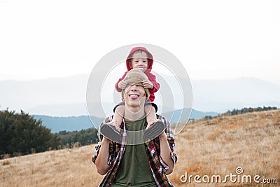 Brothers in autumn mountains Stock Photo