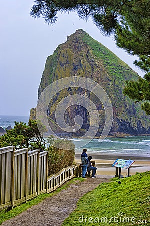 Brothers at Cannon Beach on Oregon Coast Stock Photo