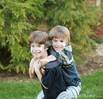 Brothers Playing Stock Photo