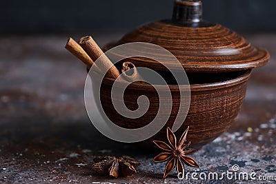 Broun bowl with mulled wine flavoring: cinnamon, star anise Stock Photo
