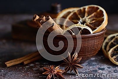 Broun bowl with mulled wine flavoring: cinnamon, star anise, orange skins Stock Photo