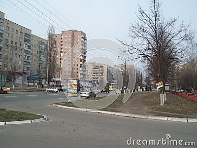 BROVARY, UKRAINE - APRIL 2, 2011. People on the streets in city Editorial Stock Photo