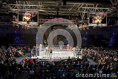 Brovary. Ukraine, 14.11.2015 Professional boxing match. Two scoreboards with annonce are over the ring Editorial Stock Photo