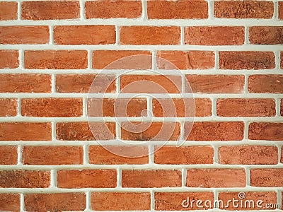 Brown brick wall with white cutting lines. Stock Photo