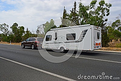 Car Towing A Caravan Stock Photo