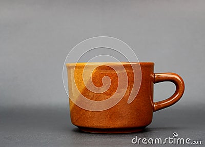 A brown ceramic cup for coffee Stock Photo