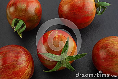 Brown cherry tomatoes on white Stock Photo
