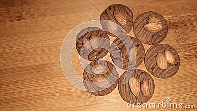 brown chocolate cookies isolated on wooden background Stock Photo