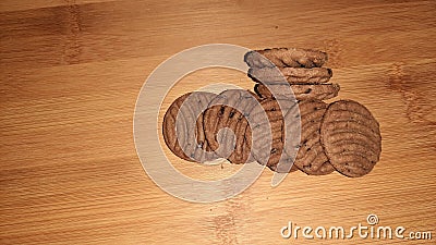 brown chocolate cookies isolated on wooden background Stock Photo