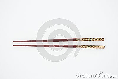 Brown chopsticks on white background Stock Photo