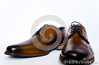 Brown classic mens shoes on a white background Stock Photo
