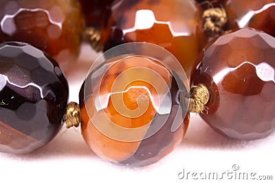 Brown faceted cornelian beads Stock Photo