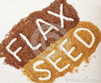 Brown and goden flax seeds. Stock Photo