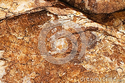 Brown golden stone rock rough texture macro Stock Photo