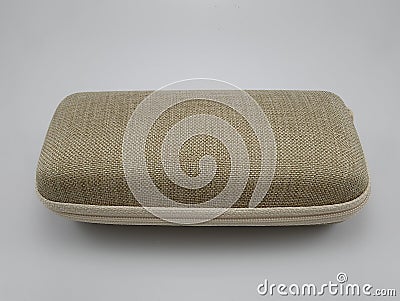 Brown hard shell fabric covering eyeglass case Stock Photo