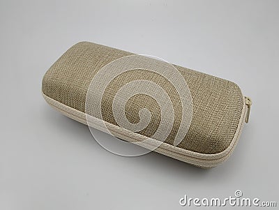 Brown hard shell fabric covering eyeglass case Stock Photo