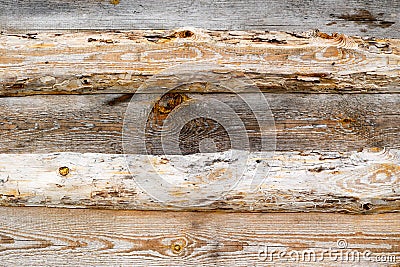 Brown horizontal texture of wooden logs, boards with knots, cracks and beautiful patterns of wood fibers Stock Photo