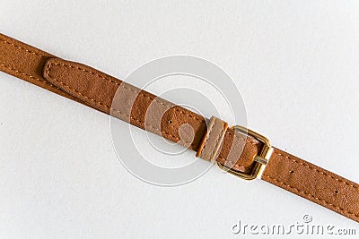 Brown leather belt with a buckle. Stock Photo