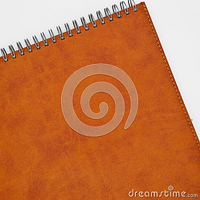 Brown leather coated spiral agenda Stock Photo