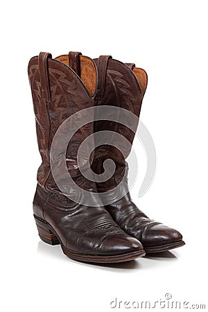 Brown leather cowboy boots on white Stock Photo