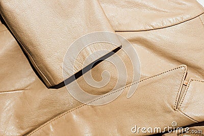 Brown leather jacket texture, genuine soft leather. Stock Photo