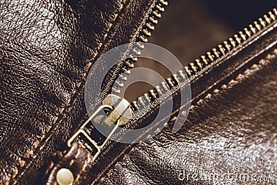 Brown leather texture and metal zipper . Fragment of leather jacket Stock Photo